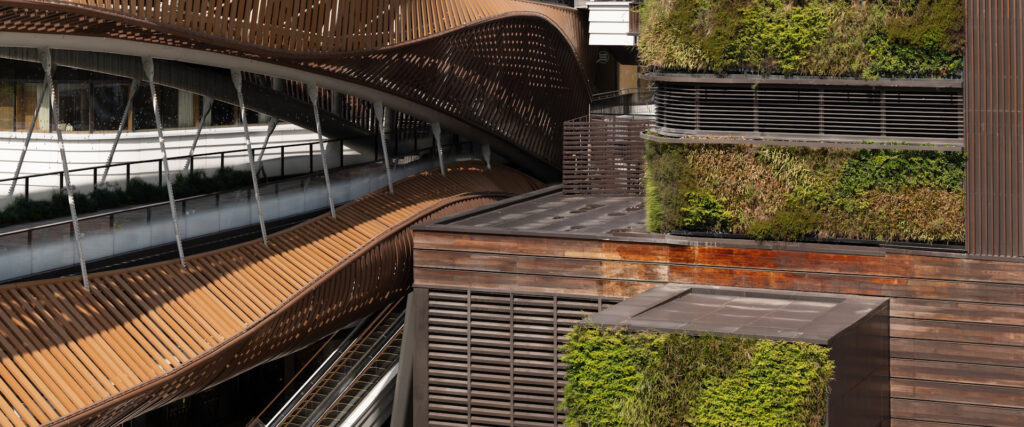 wooden building and fencing with green walls